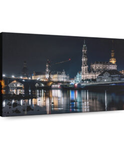 city skyline near body of water during night dresden 1 3